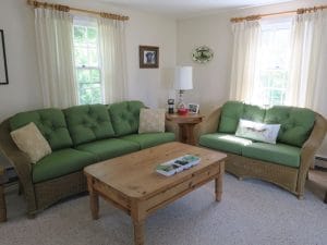 Wicker Sofa & Loveseat Cushions in a Sunbrella Spectrum Fabric | Joe Gramm Upholsterer | cape Cod Upholstery Shop Located in South Dennis, MA