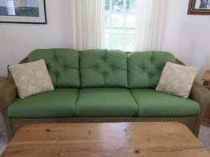 Wicker Sofa Cushions in a Sunbrella Spectrum Fabric | Joe Gramm Upholsterer | cape Cod Upholstery Shop Located in South Dennis, MA