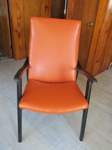 Wood Arm Chair Upholstered in a Pumpkin Vinyl Fabric | Upholstered by Cape Cod Upholstery Shop | Located in South Dennis, MA