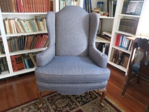 One of two wing chairs in the library room | Upholstered in a Greenhouse Fabrics | Upholstered by Cape Cod Upholstery Shop | Located in South Dennis, MA