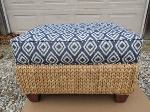 Wicker Ottoman with Attached Seat Cushion | Upholstered in a Greenhouse Fabrics | Upholstered by Cape Cod Upholstery Shop | Located in South Dennis, MA