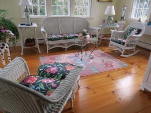 Antique Wicker Set | Upholstered in a Schumacher Chintz Floral Print | Upholstered by Cape Cod Upholstery Shop | Located in South Dennis, MA