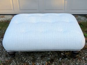 Large Buttoned Ottoman with decorative brass nail trim | Upholstered in a Sunbrella fabric | Upholstered by Cape Cod Upholstery Shop | Located in South Dennis, MA 02660