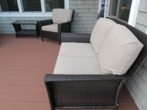 Brown Outdoor Wicker Love Seat & Chair | Cushions upholstered in Sunbrella Blend-Sand | Upholstered by Cape Cod Upholstery Shop | Located in South Dennis, MA 02660