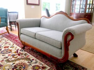 Antique Love Seat with gooseneck rolled arms and camel back style back | Upholstered in a Greenhouse Fabric from their new line of Sustain Performance Fabrics | Upholstered by Cape Cod Upholstery Shop | Located in South Dennis, MA 02660