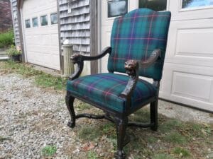 Antique lions head throne chair, side view. Upholstered in a 100% wool Tartan fabric imported from Scotland | Wood restoration by Wesley Woodworking | Upholstered by Cape Cod Upholstery Shop | Located in South Dennis, MA 02660