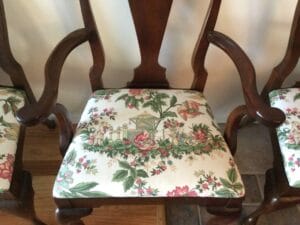 One of eight walnut dining room chairs. Two arm chairs and six side chairs. Upholstered in a vintage F. Schumacher & Company fabric, pattern Mandarin - Pavillion. | Upholstered by Cape Cod Upholstery Shop | Located in South Dennis, MA 02660