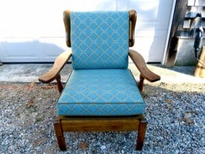 Cape Cod cottage style maple chair stained in a natural maple finish | Upholstered with an indoor-outdoor blue diamond pattern fabric | Upholstered by Cape Cod Upholstery Shop | Located in South Dennis, MA 02660