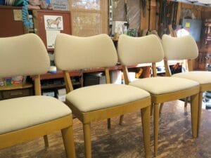 Set of 4 vintage Heywood Wakefield chairs | Upholstered in a Sunbrella Spectrum-Sand fabric | Upholstered by Cape Cod Upholstery Shop | Located in South Dennis, MA 02660