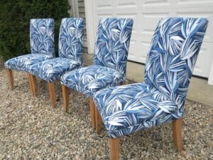 Set of four Parsons Style Chairs with a bit of a side view | Upholstered in modern Perennials print upholstery fabric | Upholstered by Cape Cod Upholstery Shop | Located in South Dennis, MA 02660