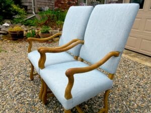 Two arm chairs from a side view as part of a set of ten chairs | Upholstered in Sunbrella Tailored Opal from the Sunbrella Fusion Collection | Upholstered by Cape Cod Upholstery Shop | Located in South Dennis, MA 02660