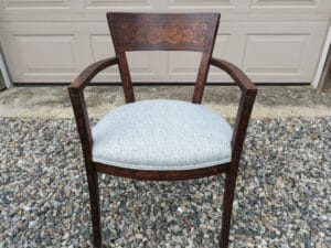 Antique arm chair with wood inlay throughout. Upholstered in a Greenhouse Fabric Crypton fabric. Photo orientation is landscape view. Upholstered by Cape Cod Upholstery Shop | Located in South Dennis, MA 02660