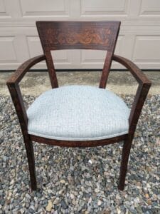 Antique arm chair with wood inlay throughout. Upholstered in a Greenhouse Fabric Crypton fabric. Photo orientation is portrait view. Upholstered by Cape Cod Upholstery Shop | Located in South Dennis, MA 02660