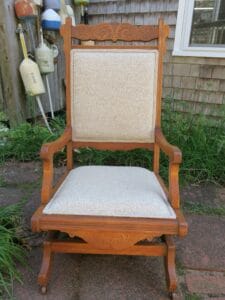 Antique Platform Rocker. Upholstered in a neutral color tweed polyester fabric with double welting trim. Upholstered by Cape Cod Upholstery Shop | Located in South Dennis, MA 02660