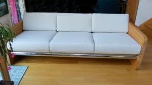 Butcher Block Sofa with a chrome metal front rail. Cushions fabricated using a Revolution Fabrics Sugar Shack Glacier performance fabric. All new CertiPur-US high density foam inserts. Upholstered by Cape Cod Upholstery Shop | Located in South Dennis, MA 02660